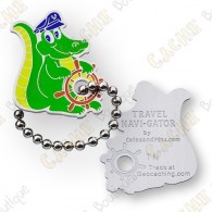  O Traveler Navi-Gator é um micro coin trackable em  geocaching.com . 